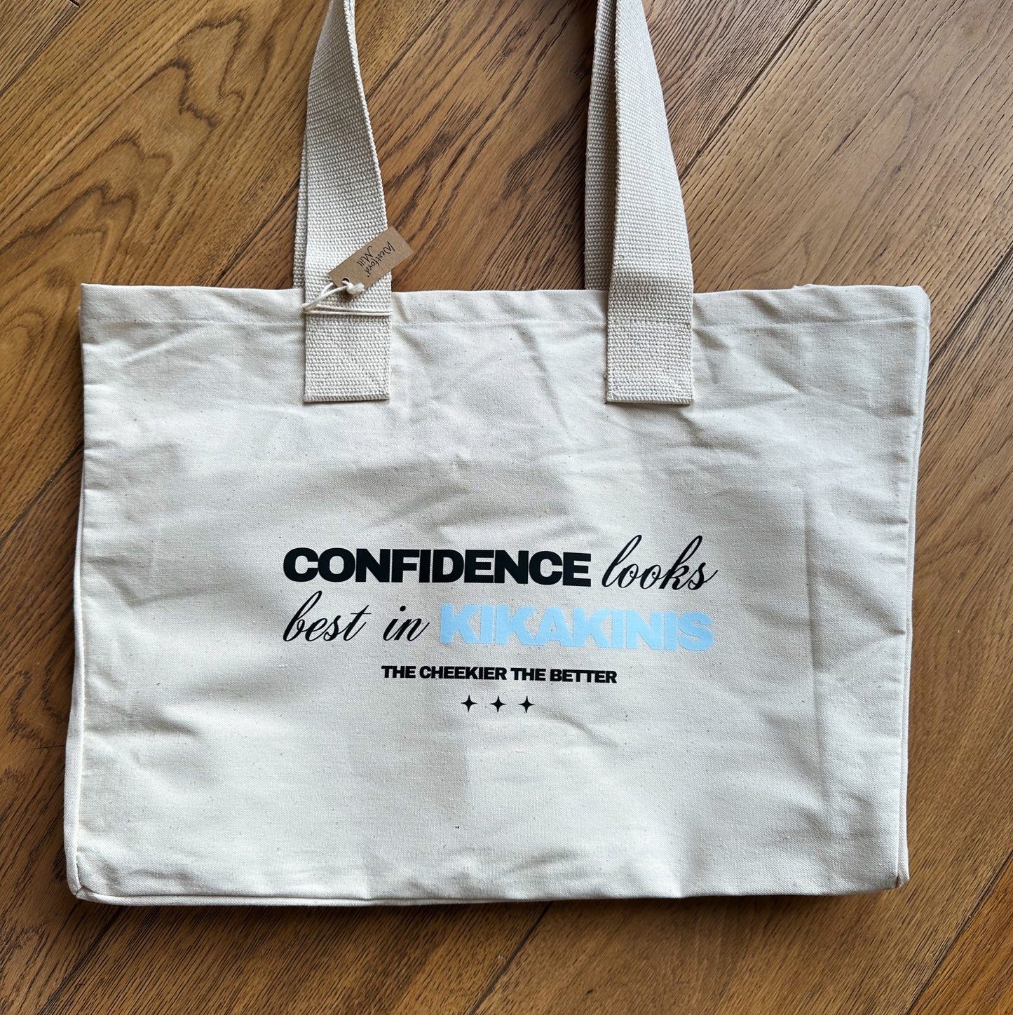 Confidence Looks Best in KIKAKINIS Tote Bag
